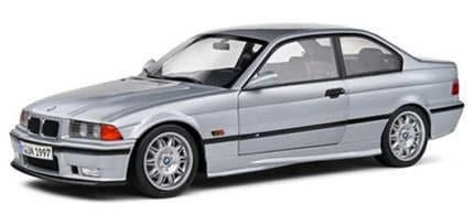 1:18 scale silver BMW diecast model car coupe with detailed wheels and black trim