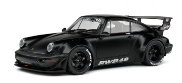 Black diecast model car, wide body, large rear wing, white RW849 decals, racing style