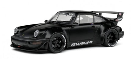Black diecast 1:18 scale Porsche RWB model car with wide body kit and large rear wing