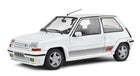 White 1:18 scale diecast model car, classic hatchback with sporty decals, detailed wheels