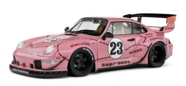 Pink diecast Porsche model car with racing decals and number 23, black wheels, large rear wing