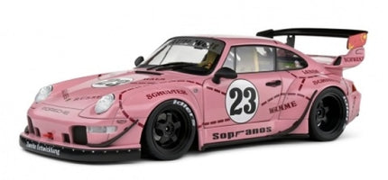 1:18 scale pink Porsche racing diecast model car with number 23 and black rear wing