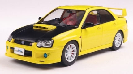 1:18 scale yellow diecast model car with black hood, rear spoiler, and white wheels