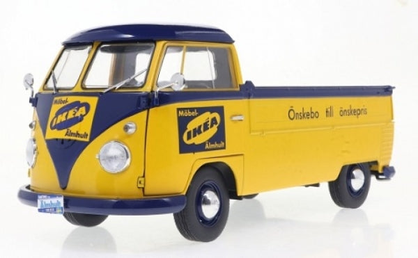 Yellow and blue diecast model VW Transporter pickup truck with retro logos and detailed features