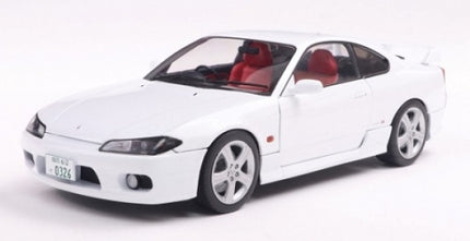 1:18 scale white diecast model sports car with red interior and detailed wheels
