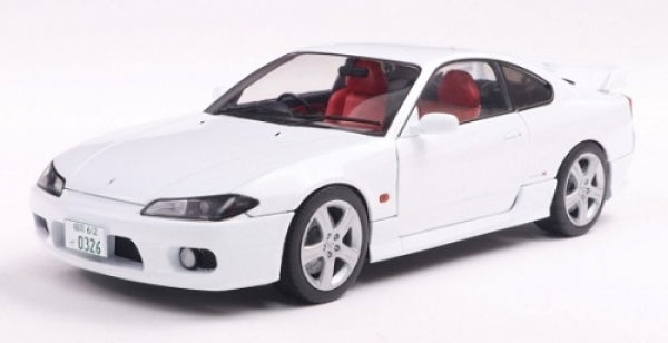 1:18 scale white diecast model sports car with red interior and detailed wheels