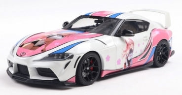 1:18 scale diecast Toyota Supra model car with anime-themed pink and white livery