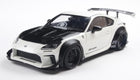 1:18 scale diecast model of white and black Toyota sports car with wide body kit and rear wing