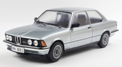 1:18 scale diecast silver BMW 323i model car with realistic detailing, displayed on white background