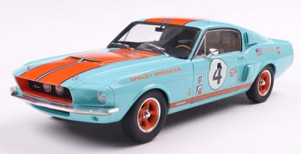 1:18 scale diecast Shelby Mustang model car in blue and orange racing livery
