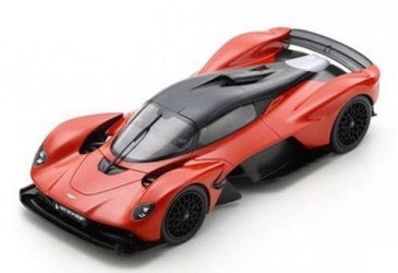 Red diecast model hypercar with black accents, aerodynamic design, 1:18 scale collectible car