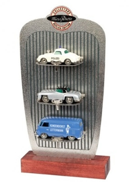 Diecast model car set display with vintage police car, sports car, and blue service van