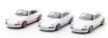 Three white diecast Porsche model cars with red, blue, and green accents, 1:18 or 1:24 scale.