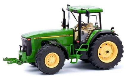 Green diecast model tractor with yellow wheels, detailed cab and realistic features