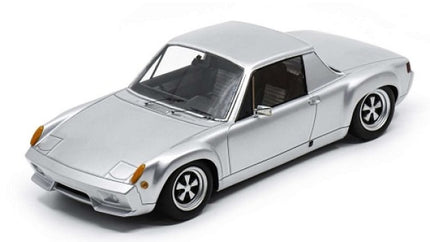 Silver diecast model car in 1:18 scale, classic coupe design with detailed wheels and interior