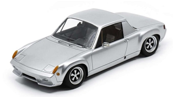 Silver diecast model car in 1:18 scale, classic coupe design with detailed wheels and interior