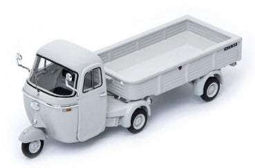 White diecast three-wheel model pickup truck with open cargo bed, 1:18 scale vehicle.