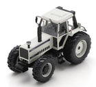 1:18 scale diecast white tractor model with detailed tires and cabin