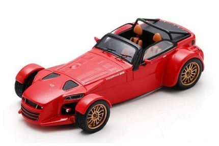 Red diecast model sports car with open roof and gold wheels, 1:18 scale collectible