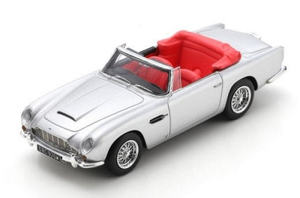 Silver diecast convertible model car with red interior, 1:18 scale collectible