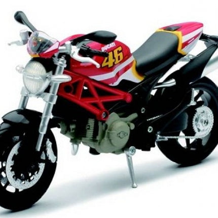 Diecast Ducati motorcycle model red and black with yellow 46 racing number, side view