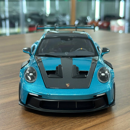 1/18 Diecast Porsche 911 GT3 RS (992, 2025) – Minichamps Dealer Edition (Ipanema Blue Metallic) - studio product photo of the