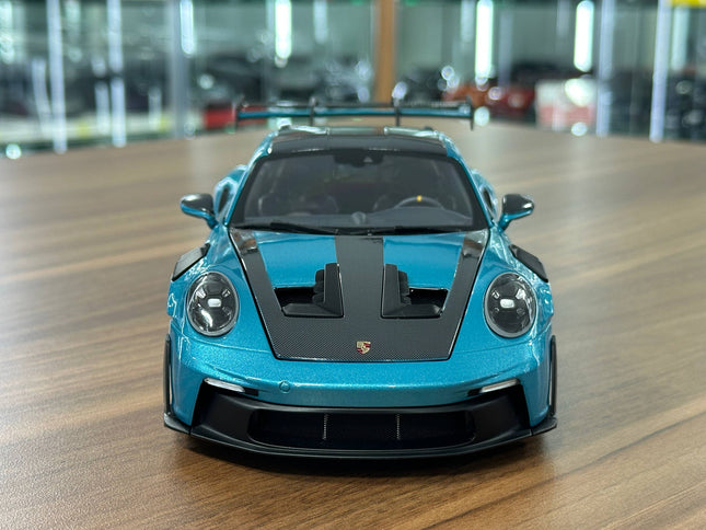 1/18 Diecast Porsche 911 GT3 RS (992, 2025) – Minichamps Dealer Edition (Ipanema Blue Metallic) - studio product photo of the