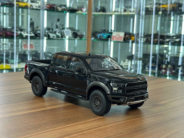 AutoArt Ford F-150 Raptor 2019 Black 1:18 Diecast Model Pickup - studio product photo of the scale model