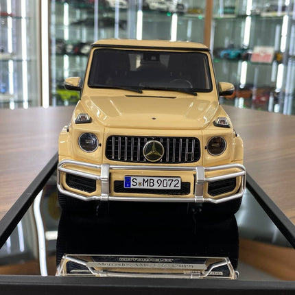 MOTORHELIX 1:18 Mercedes-Benz AMG G63 2019 Desert Yellow Limited 66 Pcs - studio product photo of the scale model