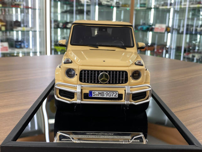 MOTORHELIX 1:18 Mercedes-Benz AMG G63 2019 Desert Yellow Limited 66 Pcs - studio product photo of the scale model
