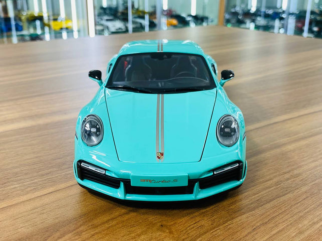 Minichamps Porsche 911 Turbo S Coupe Sport Design 2021 1/18 Diecast Green - studio product photo of the scale model