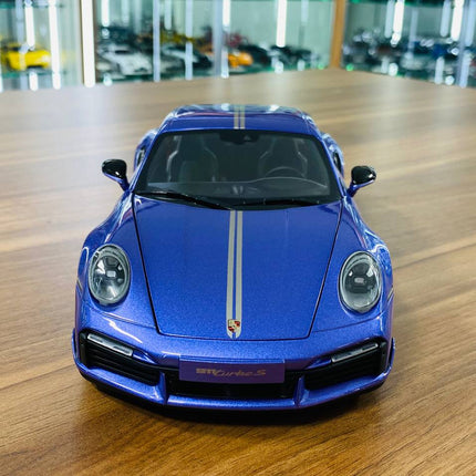 Minichamps 1/18 Porsche 911 Turbo S Sport Design 2021 Purple Diecast Model - studio product photo of the scale model