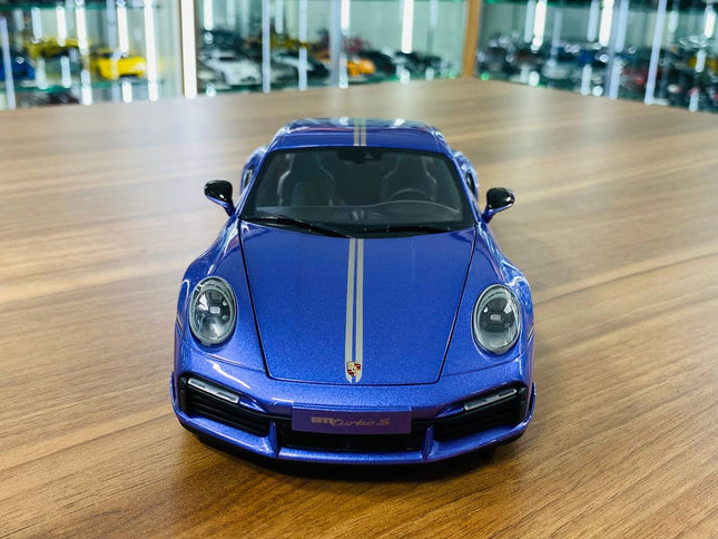 Minichamps 1/18 Porsche 911 Turbo S Sport Design 2021 Purple Diecast Model - studio product photo of the scale model