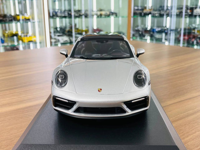 Minichamps Porsche 911 Carrera 4 GTS Silver 1:18 Diecast Model - studio product photo of the scale model