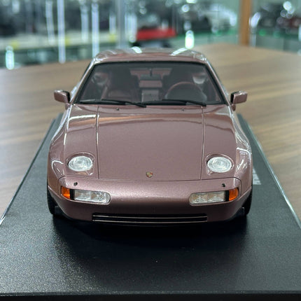 GT Spirit 1:18 Resin Porsche 928 S4 1980 Cassis Red Metallic Diecast Model Car - studio product photo of the scale model