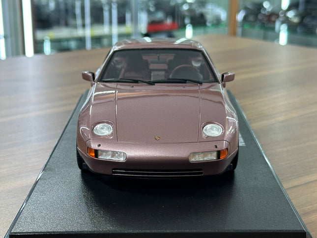 GT Spirit 1:18 Resin Porsche 928 S4 1980 Cassis Red Metallic Diecast Model Car - studio product photo of the scale model