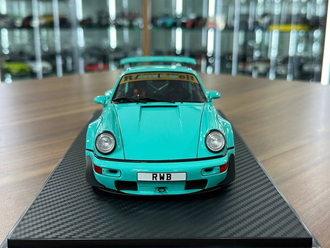 Ignition Model 1:18 Resin Porsche 964 RWB Light Blue - studio product photo of the scale model