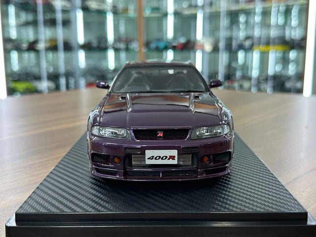Ignition Model 1:18 Resin Nissan Skyline GT-R R33 Nismo 400R Midnight Purple - studio product photo of the scale model