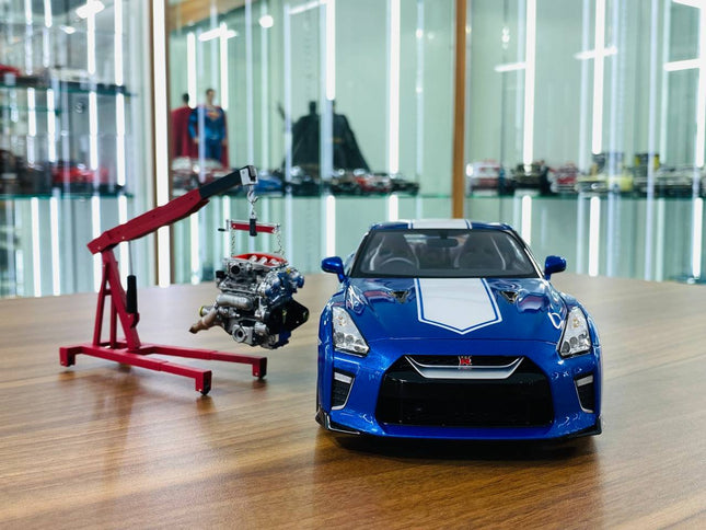 MotorHelix 1/18 Nissan GT-R R35 50th Anniversary Wangan Blue Diecast Model - studio product photo of the scale model