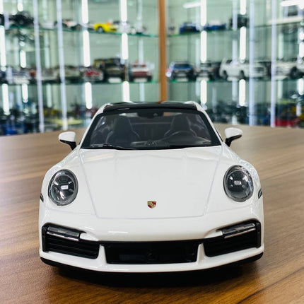 Minichamps Porsche 911 Turbo S 1:18 White Resin Model - studio product photo of the scale model