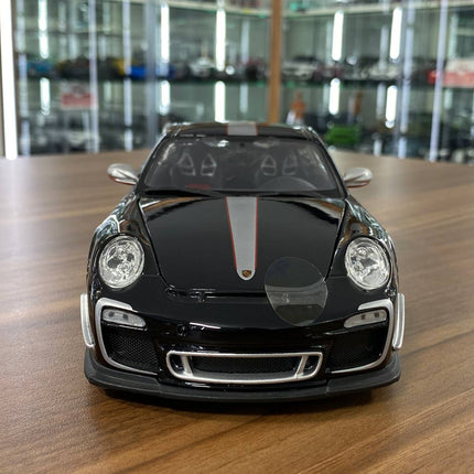 Bburago 1:18 Porsche 911 GT3 RS 4.0 Black Diecast Model Car - studio product photo of the scale model