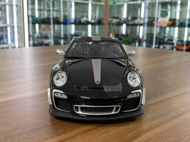 Bburago 1:18 Porsche 911 GT3 RS 4.0 Black Diecast Model Car - studio product photo of the scale model