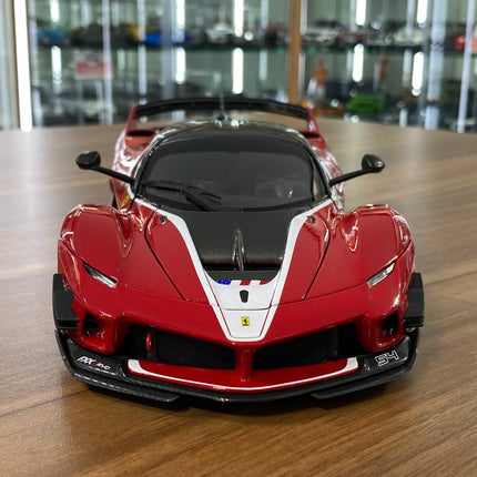 Bburago Signature Series 1:18 Ferrari FXX K EVO #54 Red White Stripe Diecast Model Car - studio product photo of the scale mo