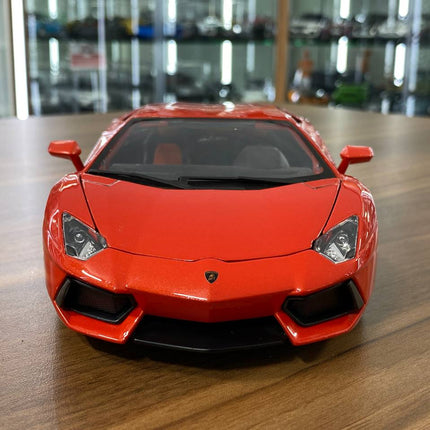 1/18 Bburago Lamborghini Aventador LP 700-4 Diecast Model Matt Orange - studio product photo of the scale model