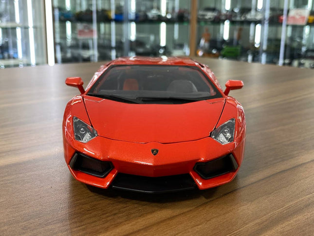 1/18 Bburago Lamborghini Aventador LP 700-4 Diecast Model Matt Orange - studio product photo of the scale model