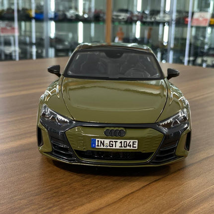 Bburago 1/18 Audi RS E-tron GT Green Diecast Model Car - studio product photo of the scale model