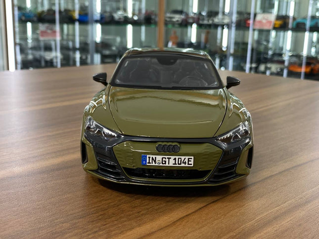 Bburago 1/18 Audi RS E-tron GT Green Diecast Model Car - studio product photo of the scale model