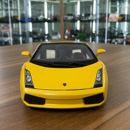 1/18 Diecast Lamborghini Gallardo Spyder Yellow Bburago Scale Model Car - studio product photo of the scale model
