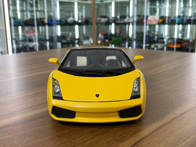 1/18 Diecast Lamborghini Gallardo Spyder Yellow Bburago Scale Model Car - studio product photo of the scale model