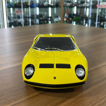 AutoArt Lamborghini Miura SV Yellow 1:18 Diecast Model Car - studio product photo of the scale model